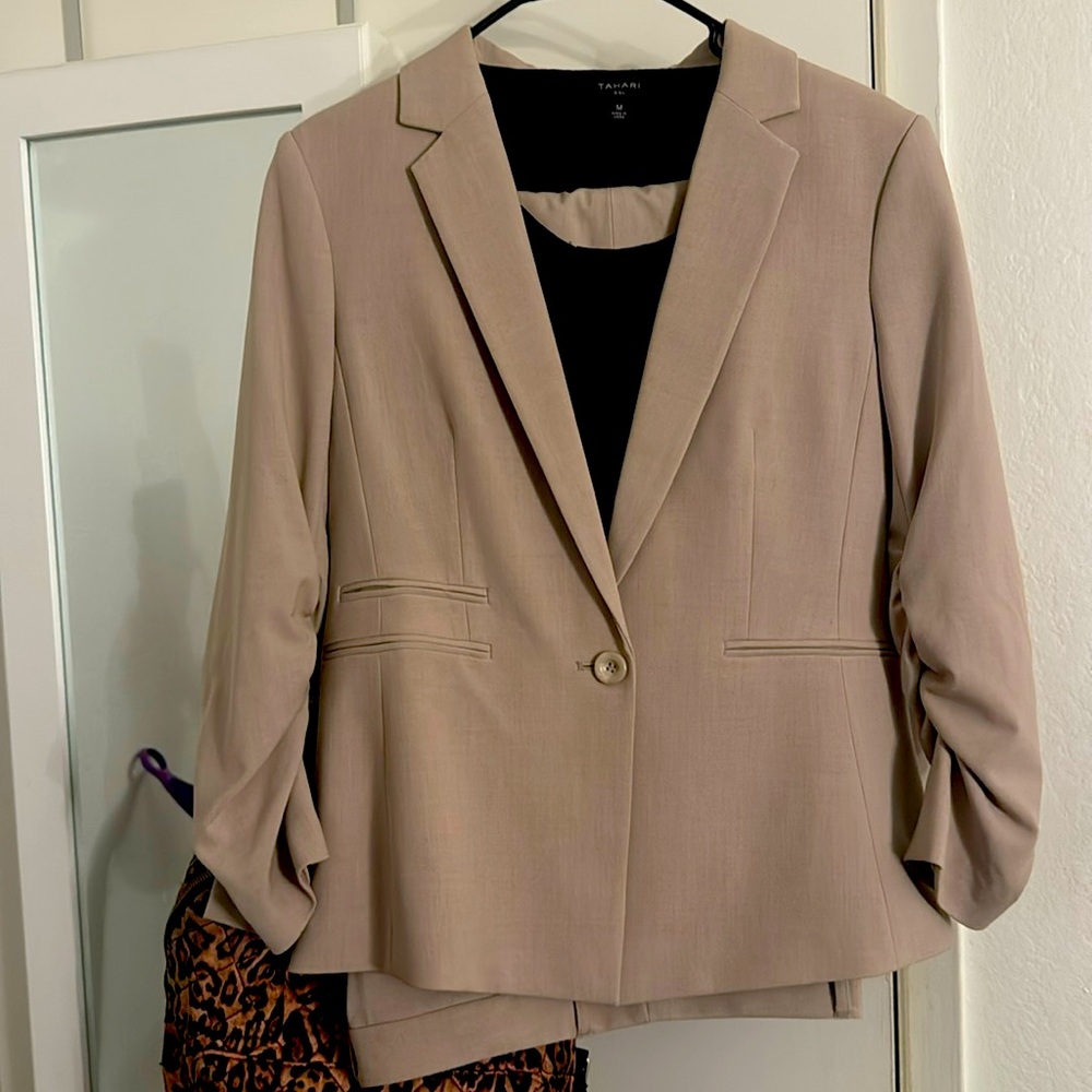 I’m selling a cream, TAHARI blazer. I also have the matching pants.